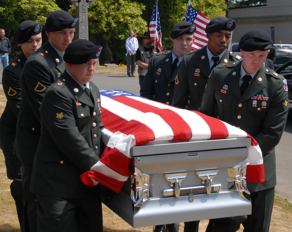 PFC Aaron E Fairbairn carried to his final resting place flag casket
