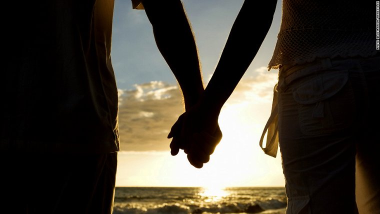 Photo credit: couple holding hands silhouette patheos.com